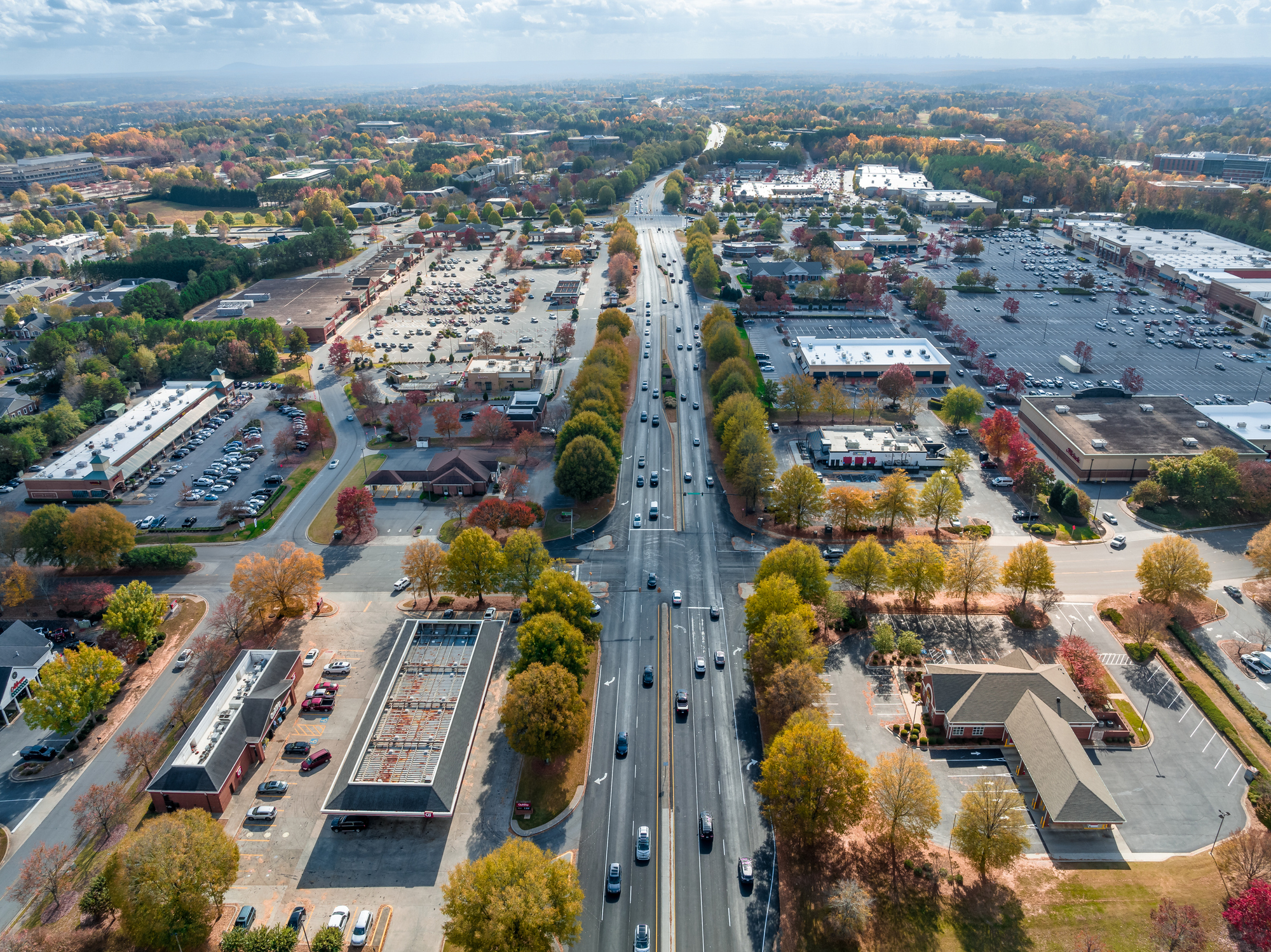 Aerial view Atlanta suburbs next to Peachtree Parkway during the Fall