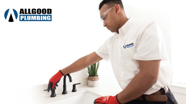 Plumber technician fixing sink plumbing in Atlanta, GA